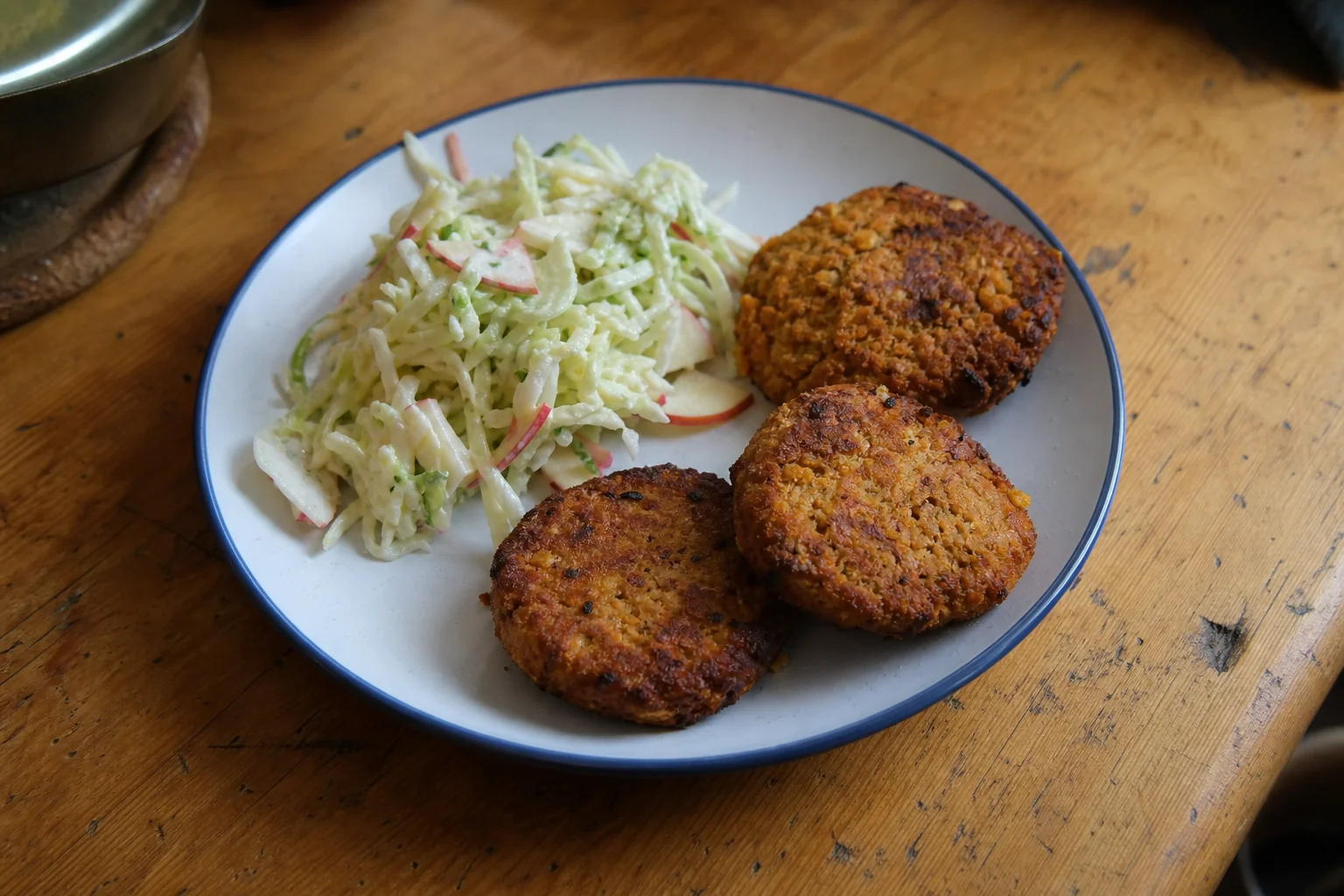 Baked chickpea and carrot patties with cabbage and apple slaw